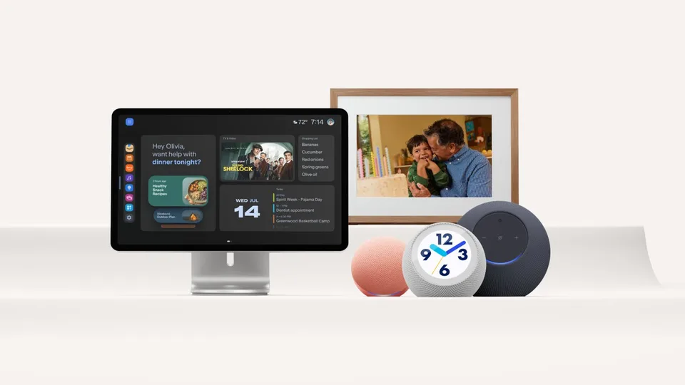 Amazon Echo devices, including a smart display and smart speakers, arranged on a white surface.